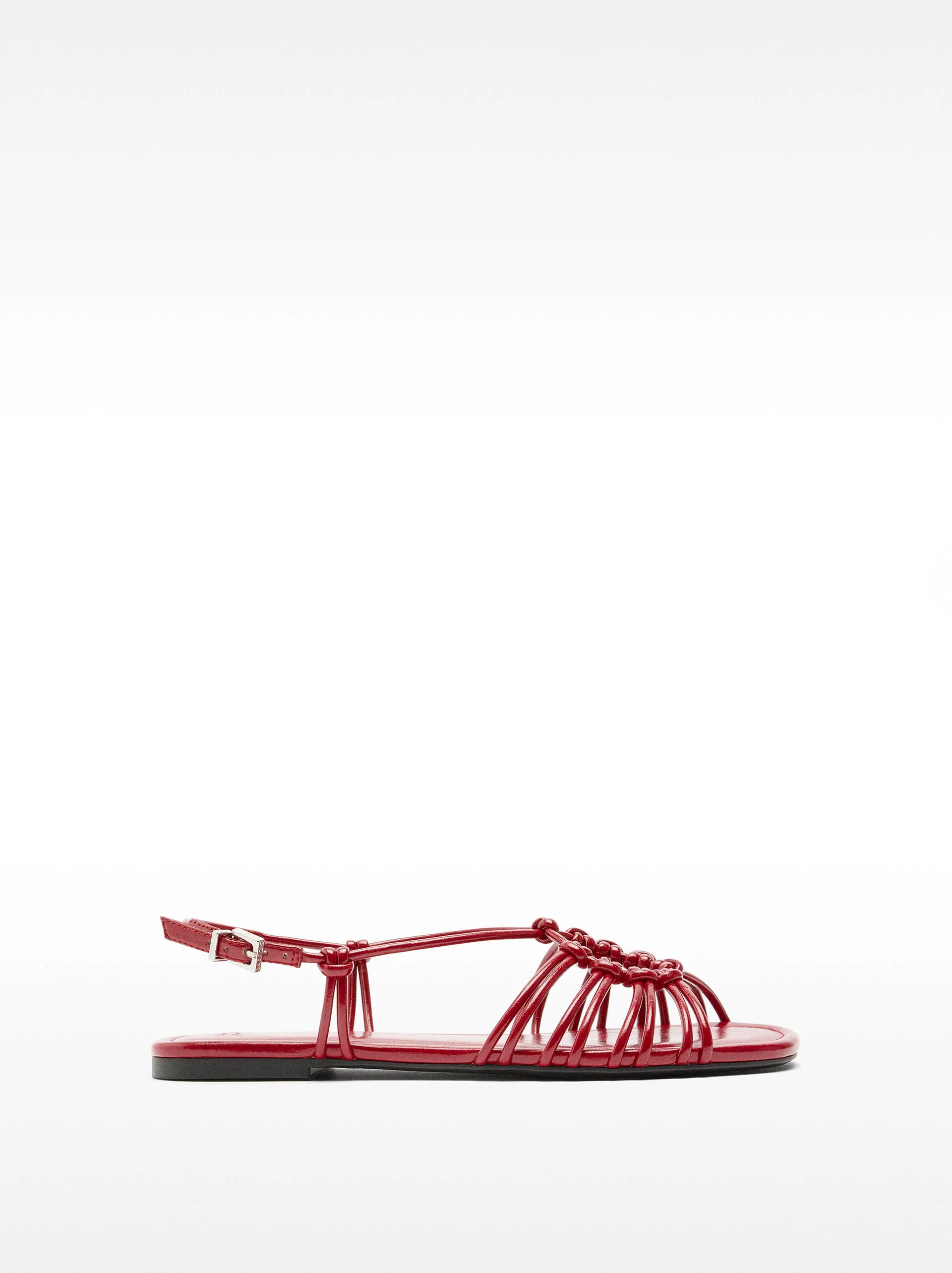FLAT SANDALS WITH STRAPS AND KNOTS