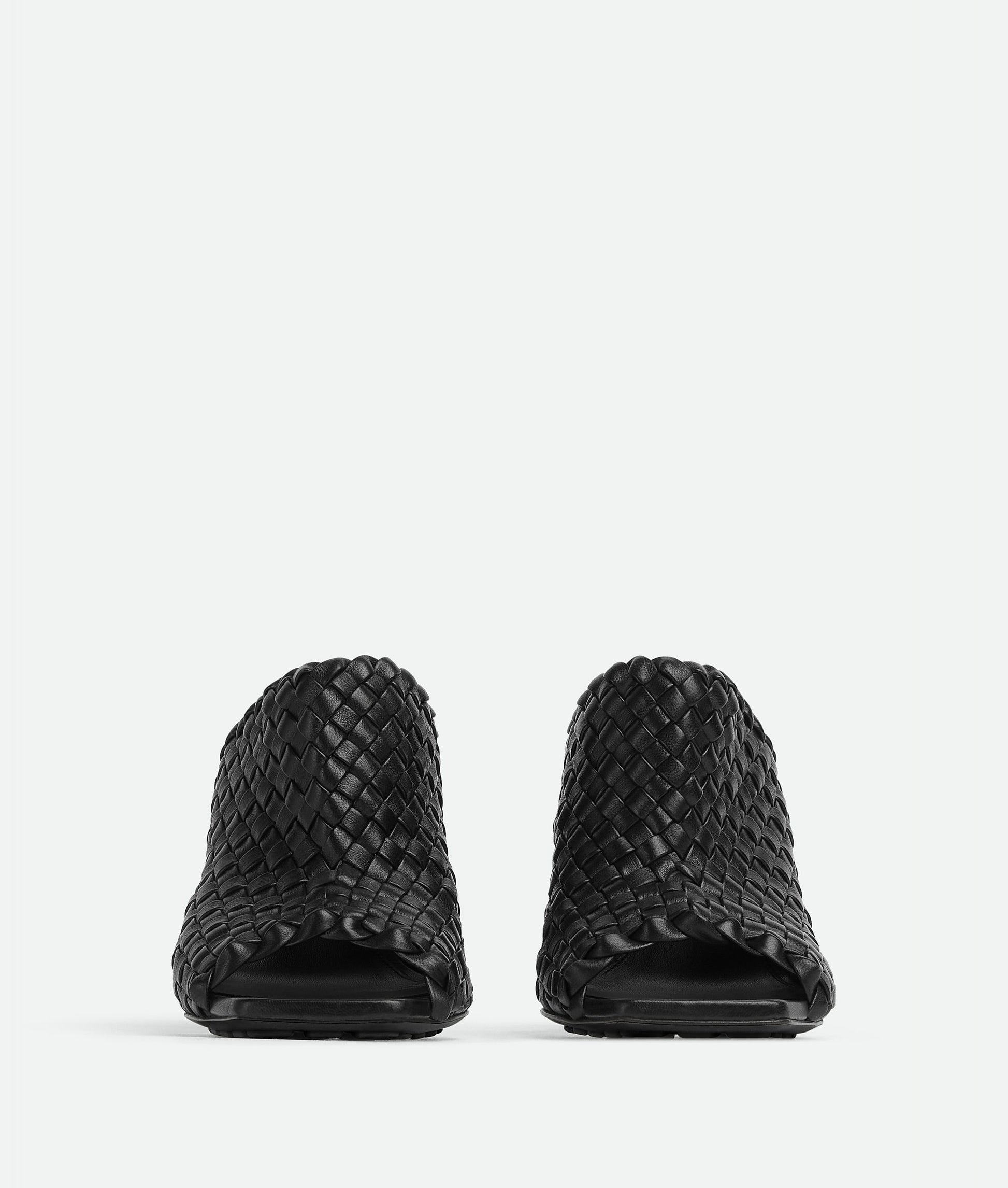 Mules in Woven Black leather