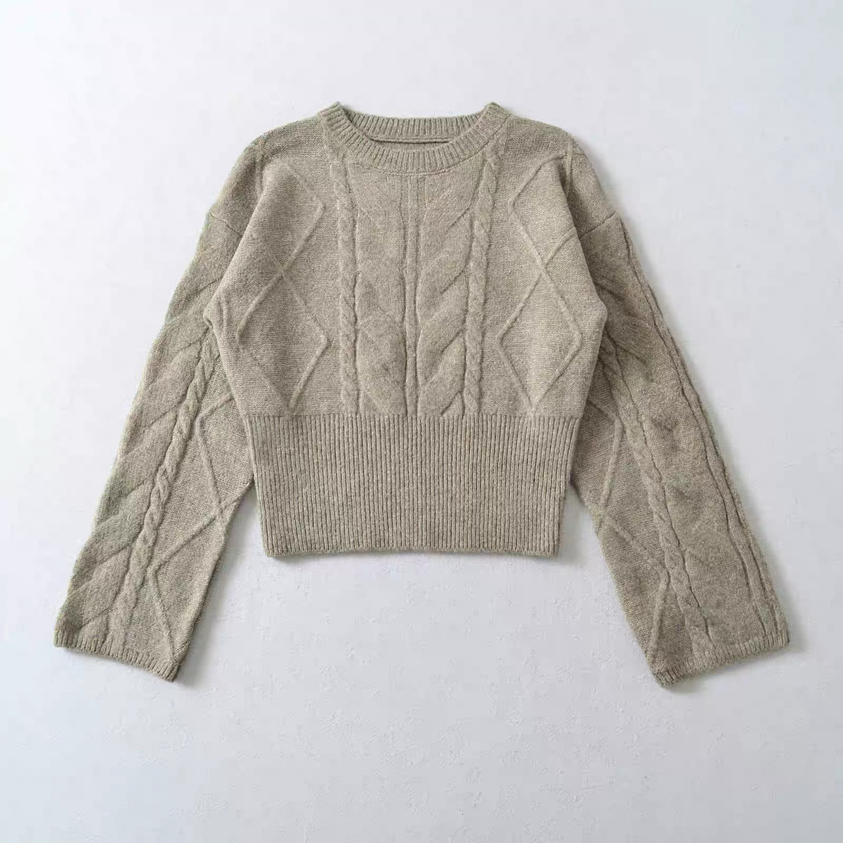 The Fitted-Hem Cable-Knit Sweater