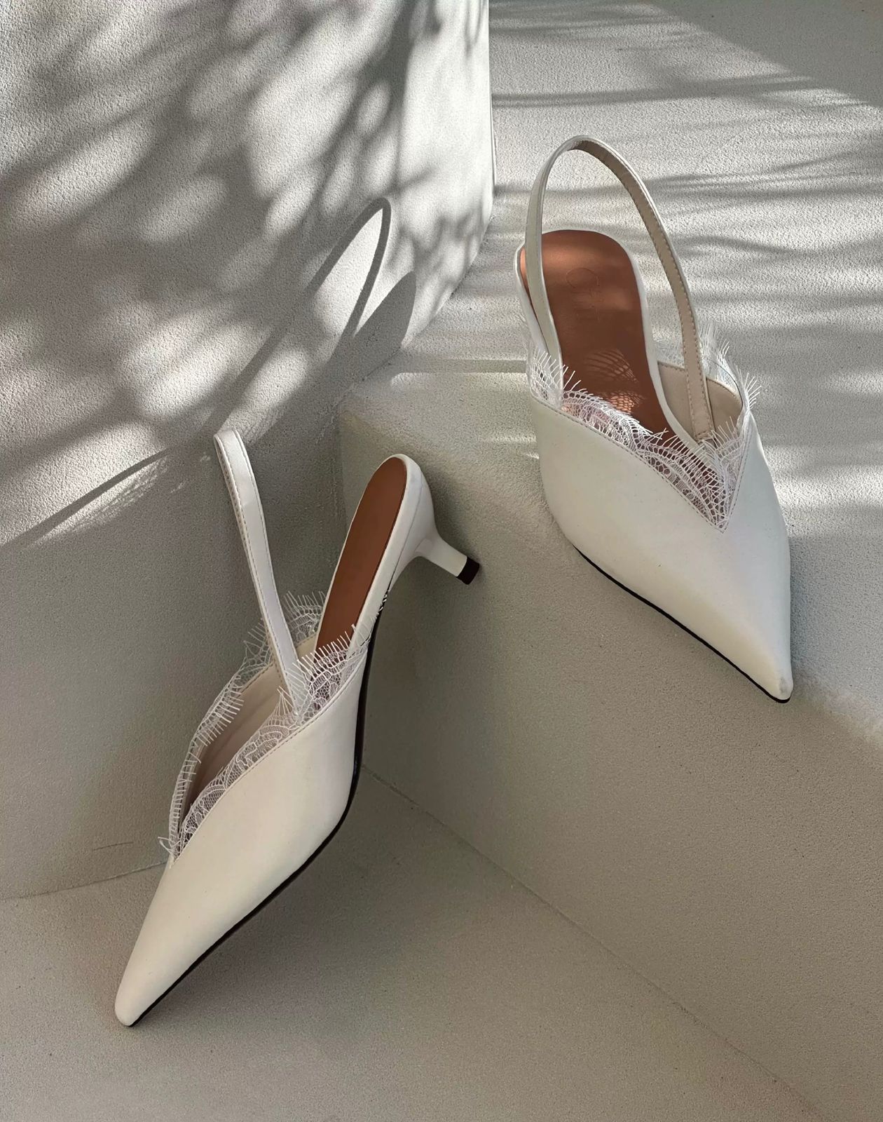 Ivory Slingback Pumps